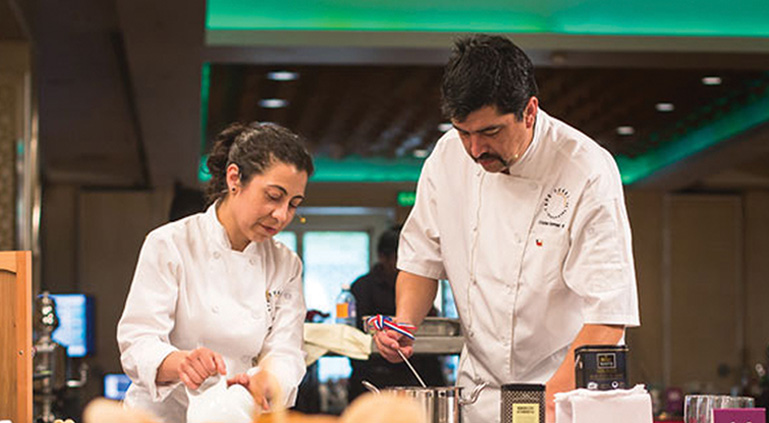 Simon Gault Judge with a Team Member of Café Turri