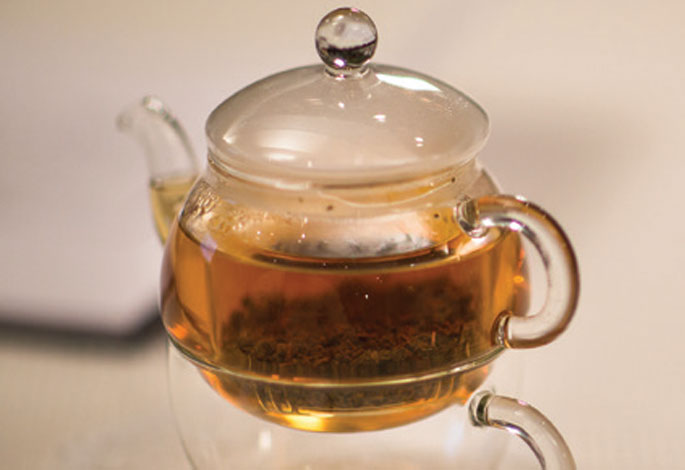 Glass Teapot filled with Tea