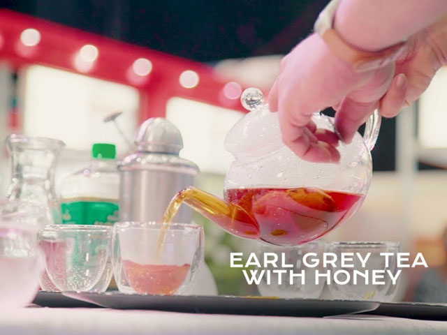 Pouring Earl Grey Tea Into Teacups