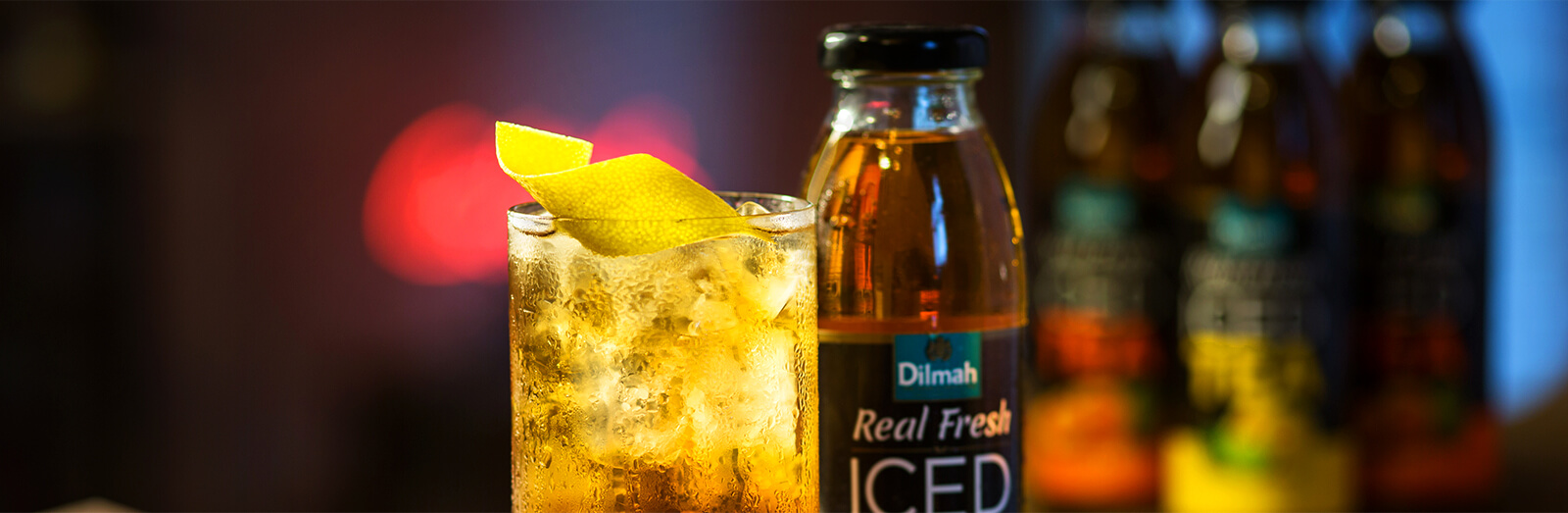 Glass of Iced Tea and a Bottle of Dilmah Real Fresh Iced Tea