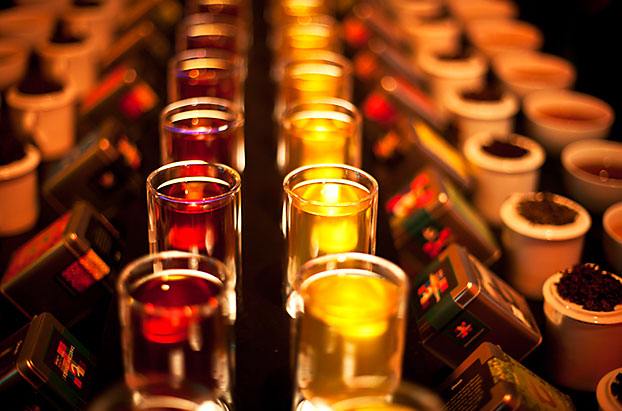 Different Flavours of Tea in dozens of Glass Cups